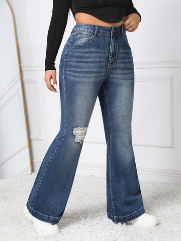 Plus Size Washed Flared Jeans With Distressed Details