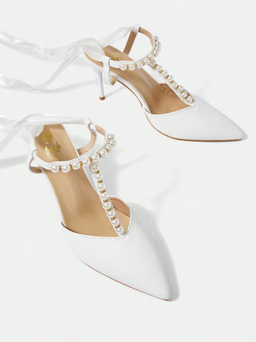 Ladies' White Wedding Shoes With Pointed Toe, Stiletto Heel, Pearl & Rhinestone Detail, And Silk Ribbon