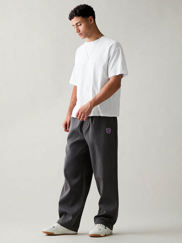 Men Regular Fit Woven Casual Pants With Letter Print Pocket And Straight Leg