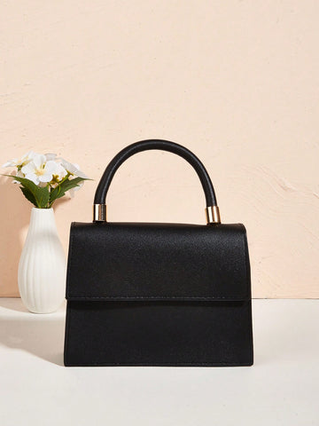 Fashionable Wristlet Decorative Handbag With Hardware Accents