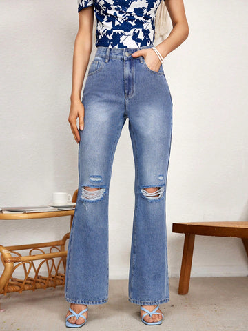 Women's Flared Jeans With Distressed Details