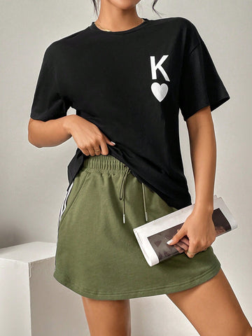 Women's Casual Style Loose Fit Chest Print Short Sleeve T-Shirt And Color Block Curved Hem Skirt With Slanted Pockets Set