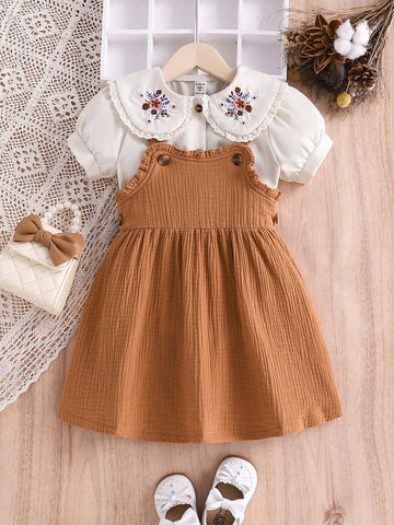 Young Girl 2pcs/Set Europe And America Vacation Strap Dress And Short Sleeve T-Shirt With Flower Embroidery For Spring And Summer