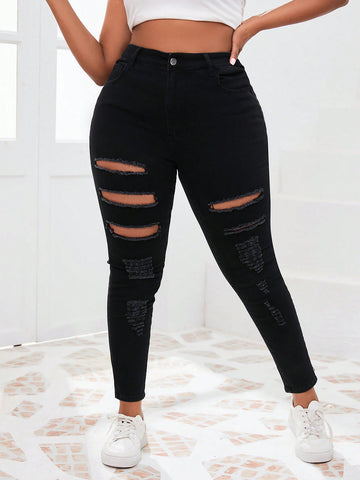 Plus Size Women's Tight-Fit Nine-Point Ripped Jeans