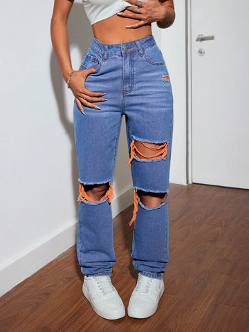 Jeans With Pockets And Distressed Design