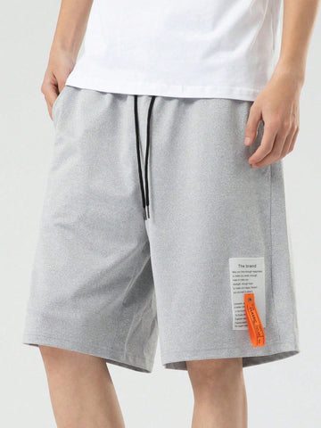Loose Men Slogan Graphic Patched Shorts