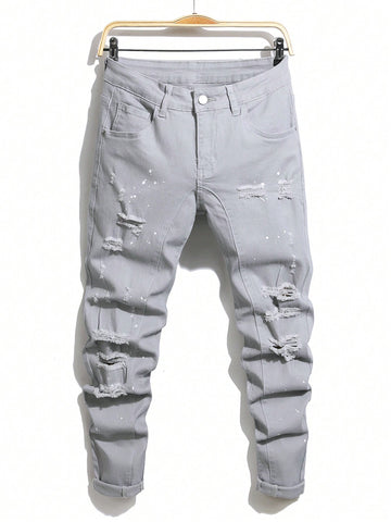 Men\ Ripped Slanted Pocket Street Fashionable Tapered Jeans