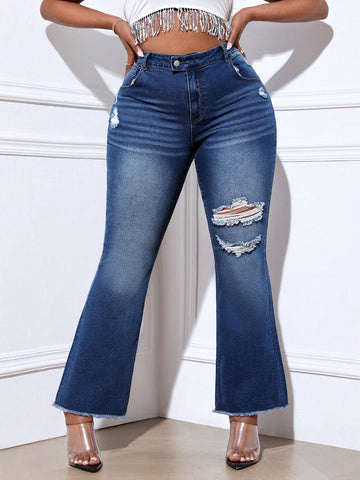 Women's Plus Size Flared Jeans With Distressed Holes, Frayed Hem, And Washed Denim